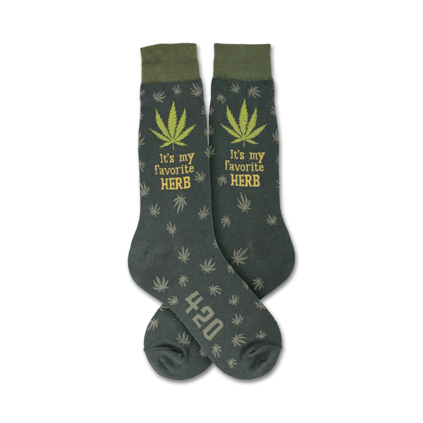 Pair of dark-green crew socks with a repeating cannabis leaf pattern, 'It's my favorite HERB' text, and '420' detail.