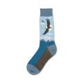Single blue crew sock showcasing a detailed image of a bald eagle in flight over mountains.