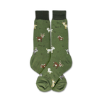 Close-up view of a pair of green crew socks with a goat design, showcasing the 'Bleat it!' text and details of the goat illustrations.