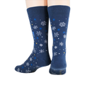 Close-up detail shot highlighting the snowflake and text design on the socks.