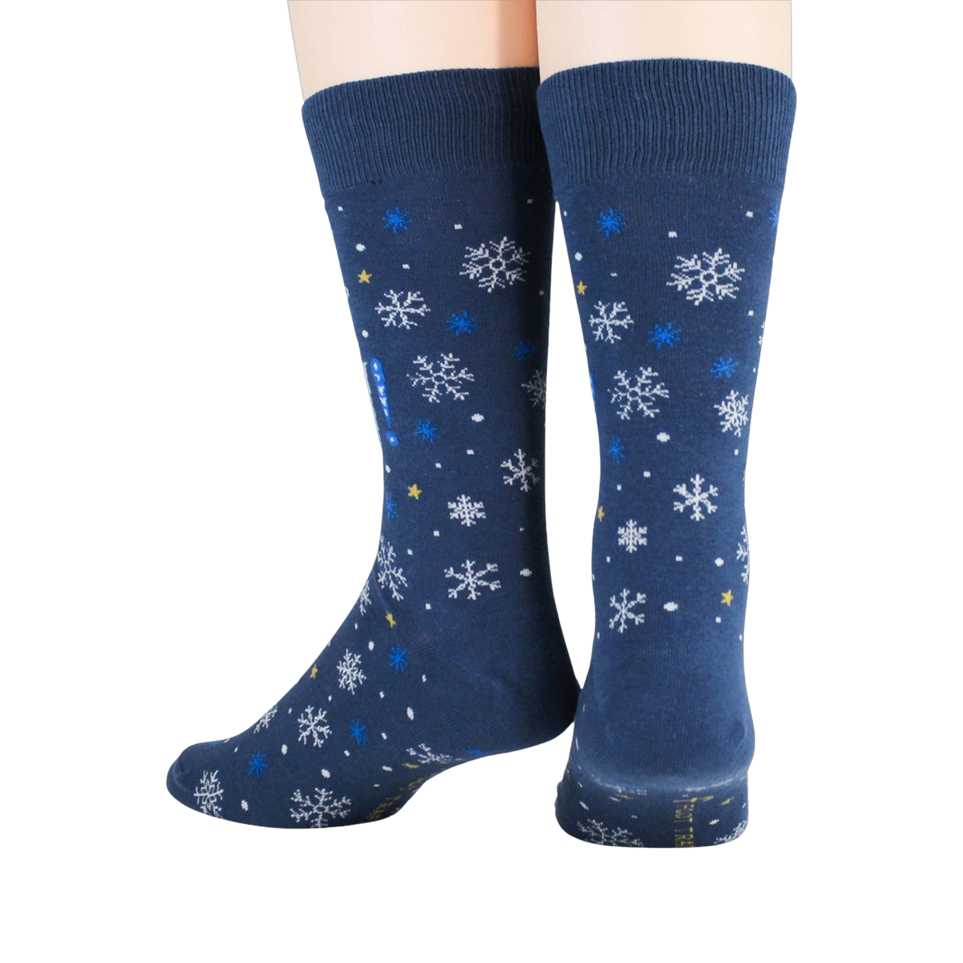 Close-up detail shot highlighting the snowflake and text design on the socks.