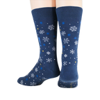 Close-up detail shot highlighting the snowflake and text design on the socks.