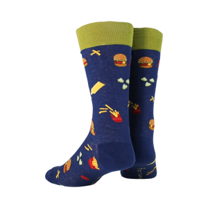 A pair of blue socks with a pattern of burgers, fries, and other food items. The socks have a green cuff.