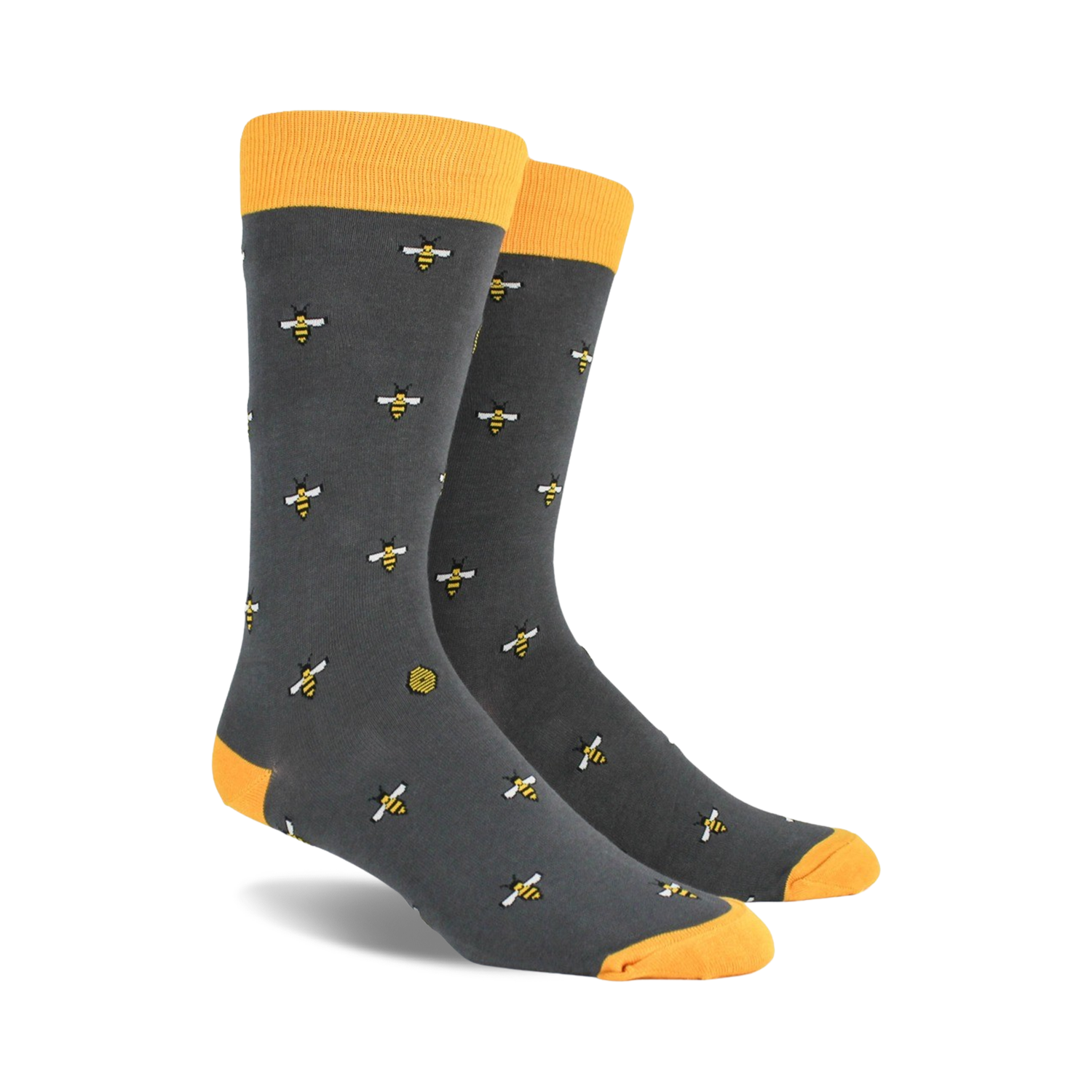 A pair of charcoal gray crew socks with a repeating pattern of yellow bees and honeycombs. Yellow tops.
