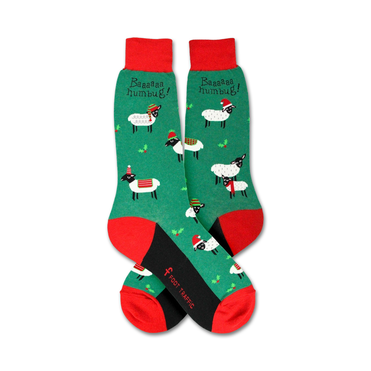 Flatlay showcasing a pair of green Christmas sheep socks with red and black accents.