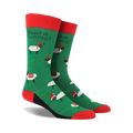 Pair of crew socks; green background with festive sheep wearing Santa hats; red and black accents; 'Baaaa humbug!' text.
