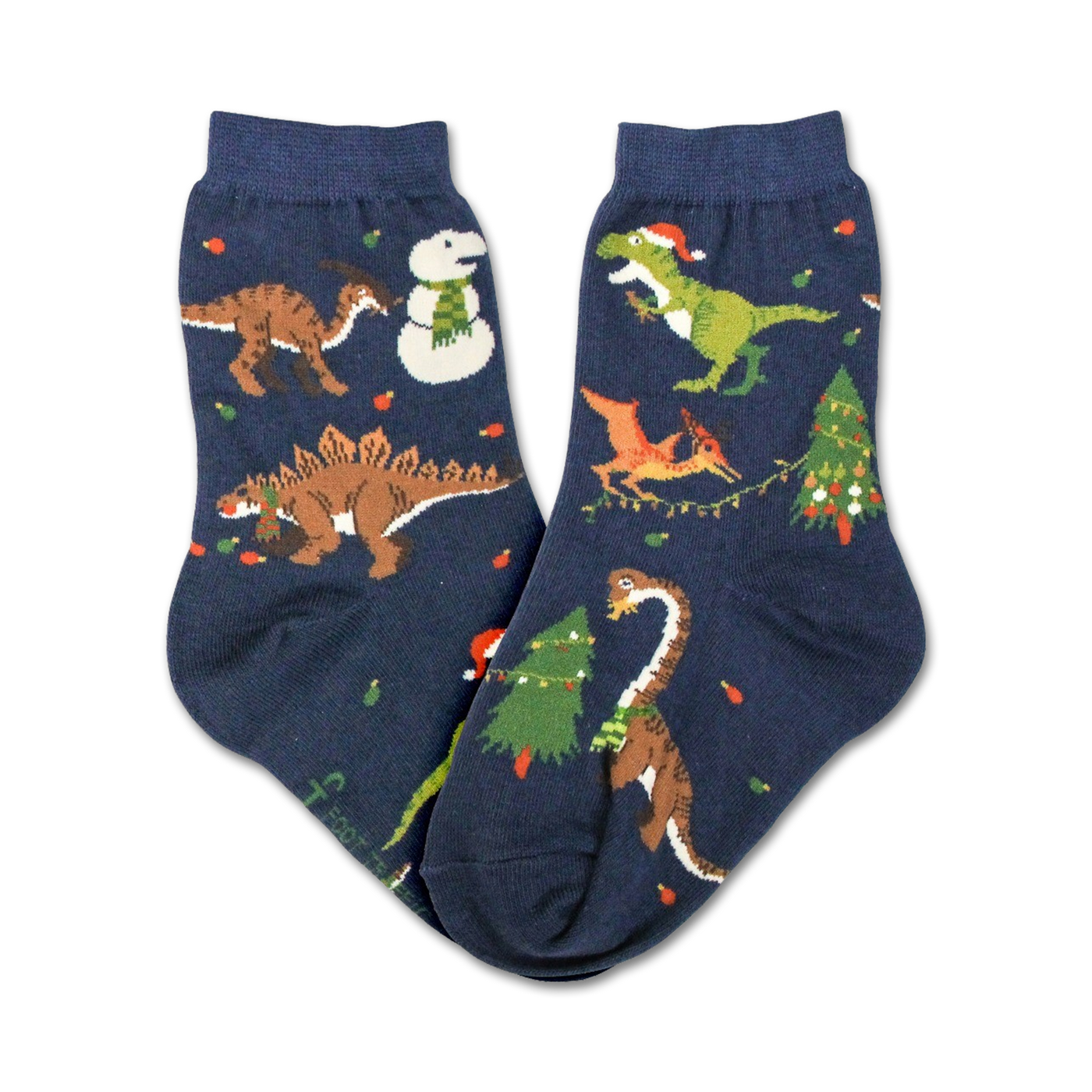 Pair of navy blue crew socks featuring a whimsical Christmas design with dinosaurs, snowmen, and Christmas trees.