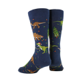 Back view of navy blue crew socks with a Christmas dinosaur pattern.