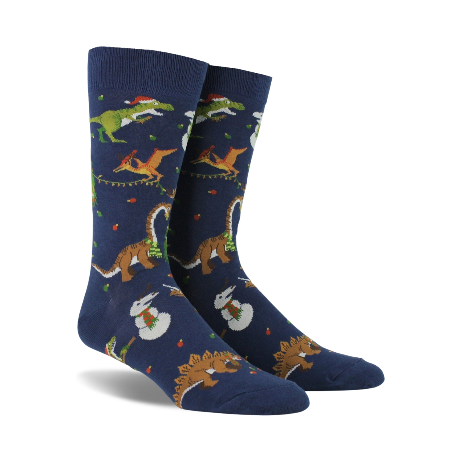 Pair of navy blue crew socks. Feature a whimsical Christmas design with dinosaurs decorating trees and snowmen.