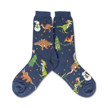 dinosaur socks for women with christmas trees and presents pattern in dark blue. tree rex theme.  