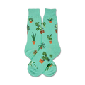 Pair of teal crew socks with illustrated potted plants. Fun, quirky design for plant lovers.