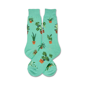 crew socks in light green feature various potted plants in different colored pots.   