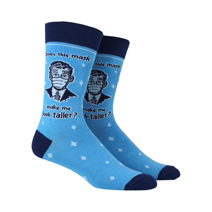 A pair of blue socks with white stars and a man in a suit wearing a mask on them. The text on the socks says 