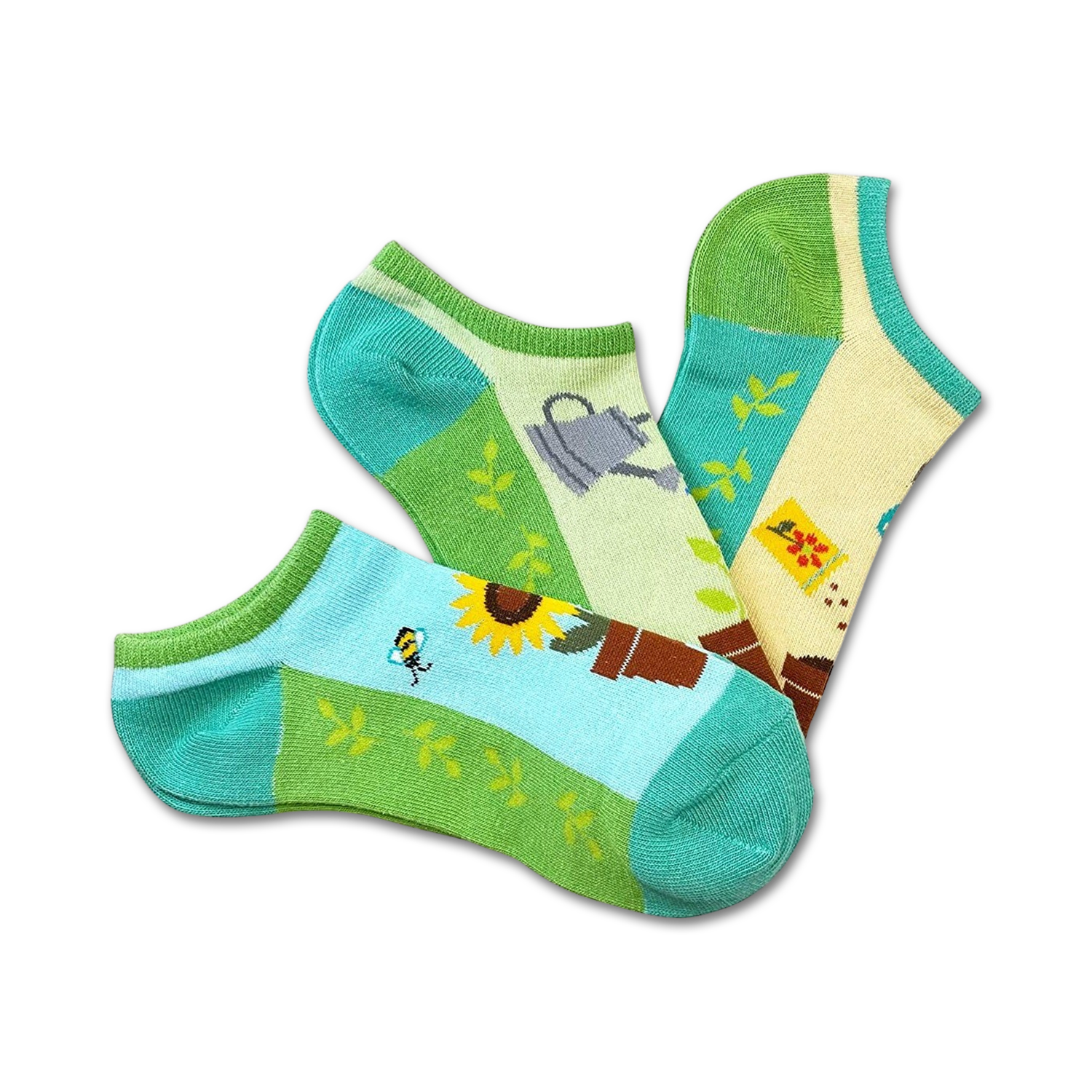 Three ankle socks in a 3-pack. Designs include sunflowers, watering cans, and gardening tools on a pastel green, yellow, and blue background.