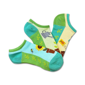 blue, green, and yellow no-show socks featuring sunflowers, bees, watering cans, and gardening tools.  