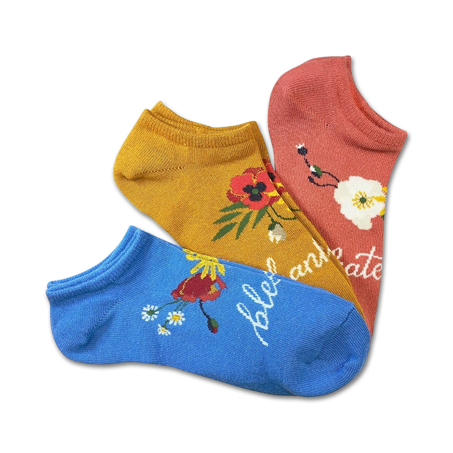 Three low-cut socks in a 3-pack.  Mustard yellow, coral pink, and light blue socks with floral designs and the word 'celebrate'.