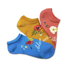 blessings 3 pack of no show socks for women feature inspirational floral patterns in various colors on a yellow, blue, or pink background.   