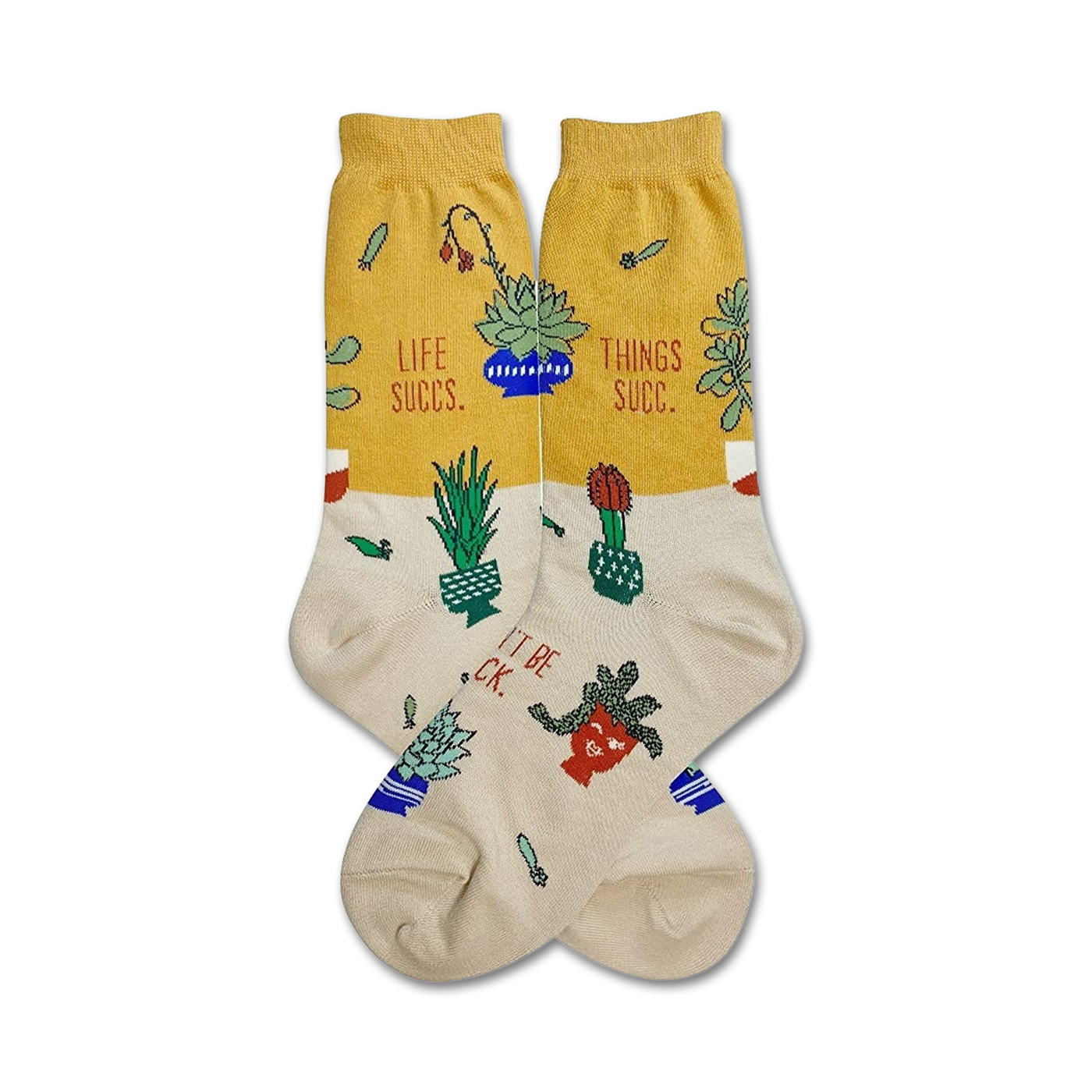 A pair of cream and mustard yellow crew socks with a fun illustration of succulents, cacti, and the phrases 'Life Succs' and 'Things Succ'.