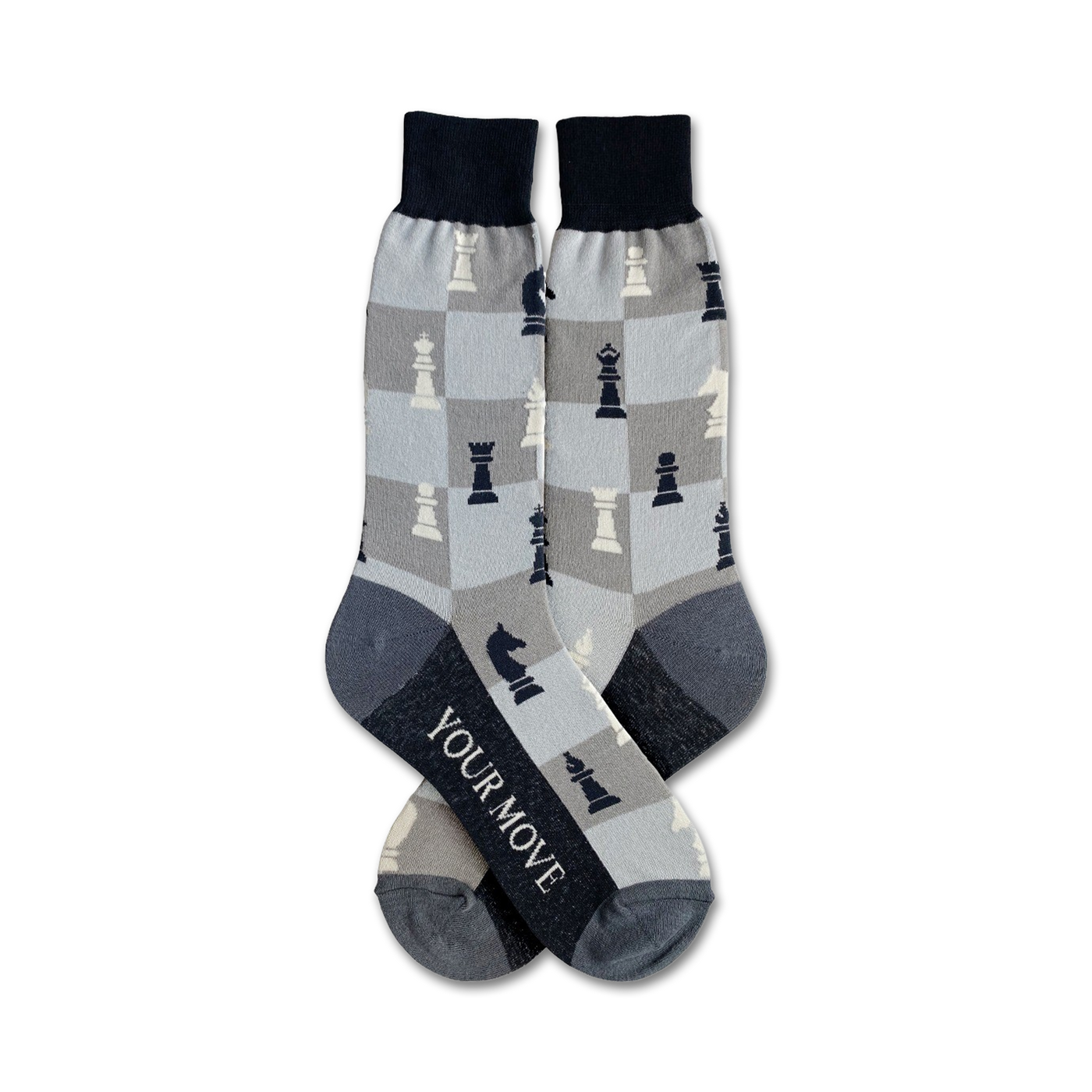 Pair of crew socks in grey and navy blue.  Chessboard pattern features black and white chess pieces.  Text on the socks reads 'Your Move'.