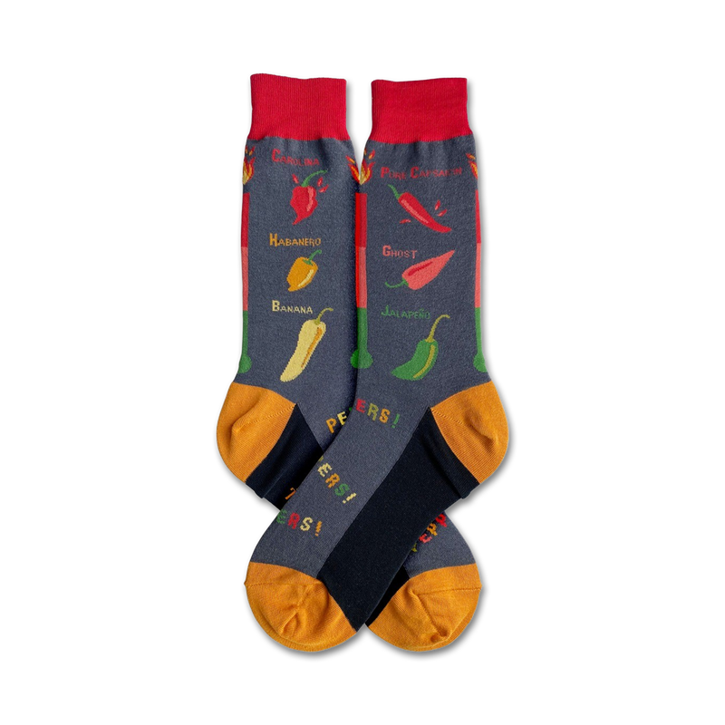 Pair of crew socks in gray with colorful chili pepper illustrations and names. Yellow and red accents on the cuffs.  'Peppers!' is written on the soles.