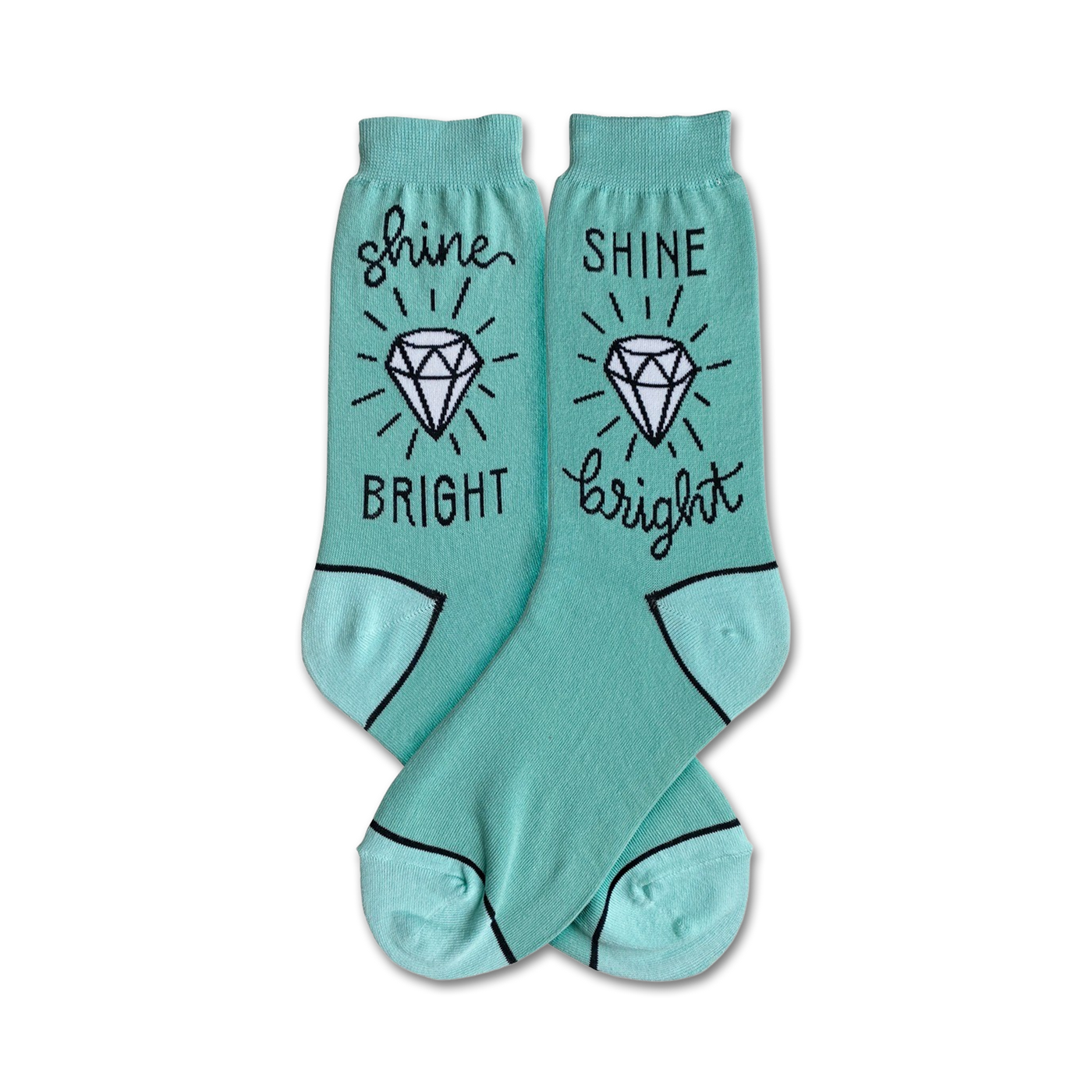 Pair of teal crew socks with a white diamond and 'Shine Bright' text in black. Fun, sparkly design!
