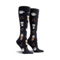 Pair of black knee-high socks adorned with illustrations of coffee cups, coffee beans, and frothy drinks. A fun and cozy design!