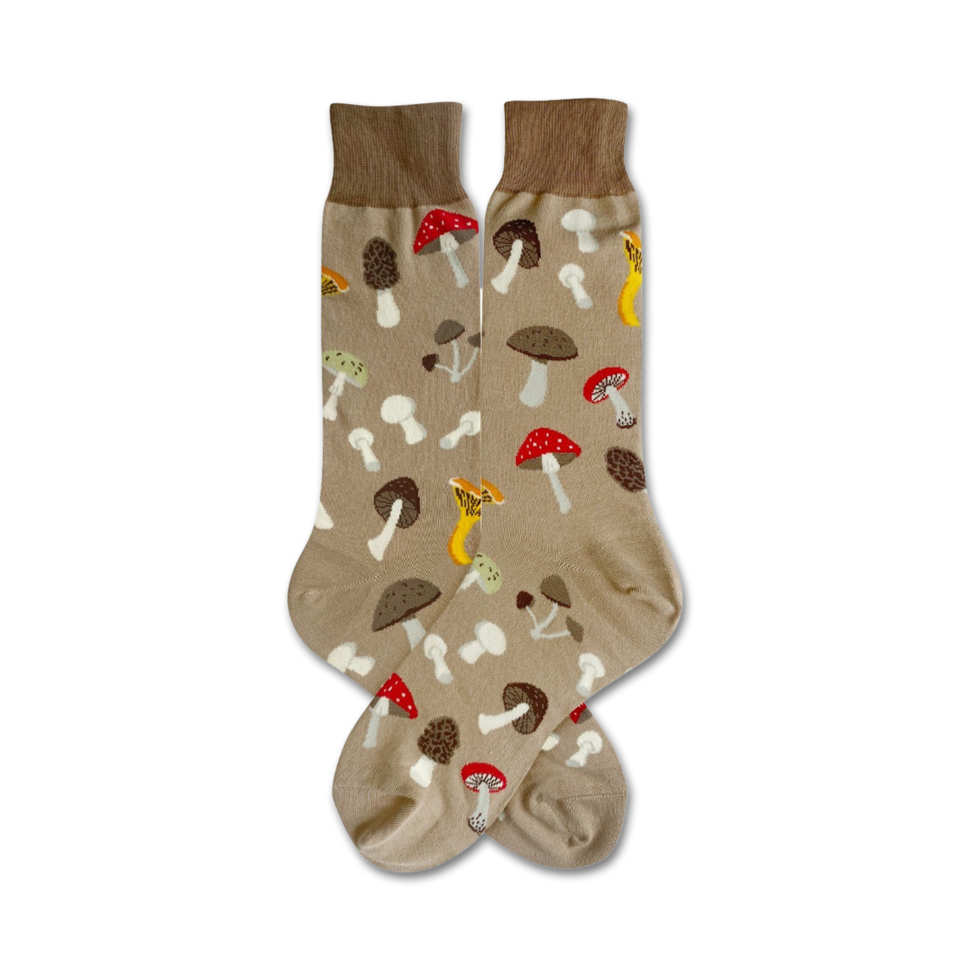 A pair of beige crew socks adorned with a whimsical pattern of various mushrooms in shades of brown, red, and yellow.