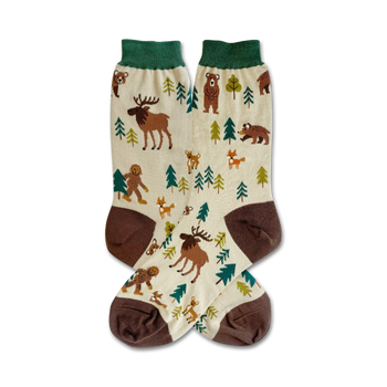 woodlands creatures socks in cream, brown, and green with adorable forest animals and bigfoot design.  