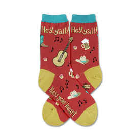 women's country crew socks in red feature musical notes, cowboy boots, hats, guitars, beer mugs, and cacti.   