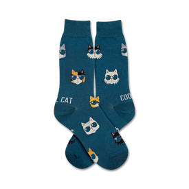 blue crew socks with a pattern of cartoon cats wearing sunglasses and the words "cat" and "cool" written on them. mens.  