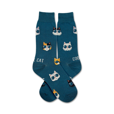 blue crew socks with a pattern of cartoon cats wearing sunglasses and the words "cat" and "cool" written on them. mens.  