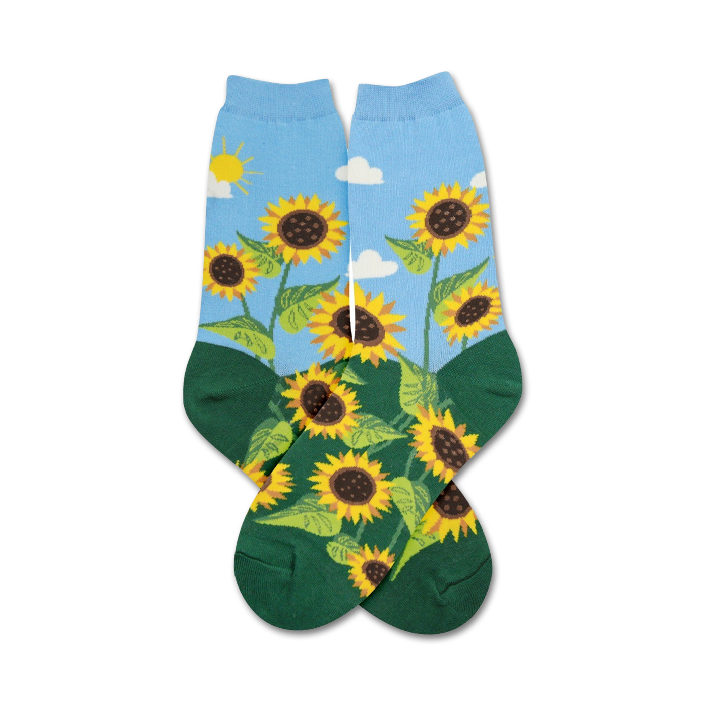 A pair of crew socks with a sunflower design. The socks are mainly light blue with green at the bottom and feature yellow sunflowers and a simple sun and clouds.
