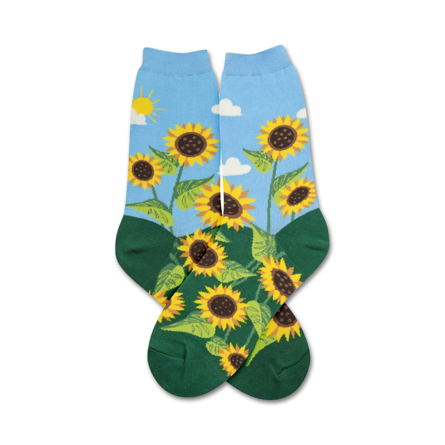 A pair of crew socks with a sunflower design. The socks are mainly light blue with green at the bottom and feature yellow sunflowers and a simple sun and clouds.