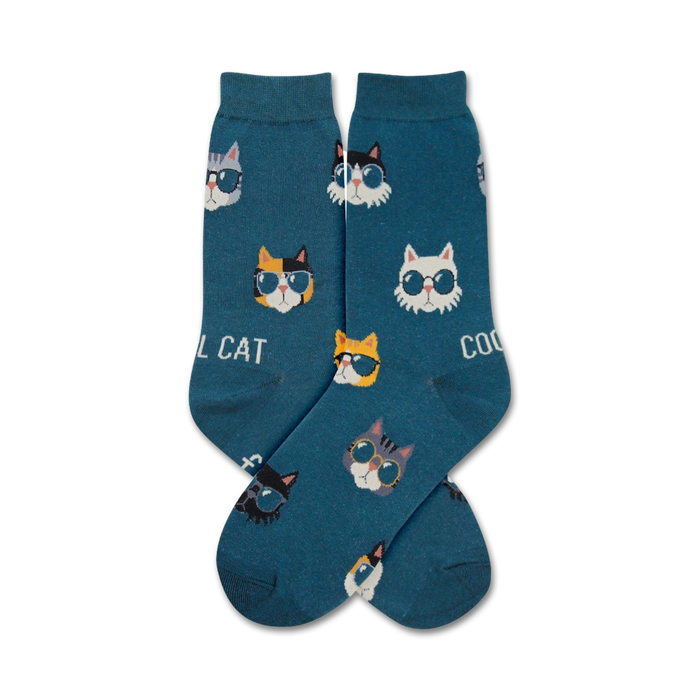 women's blue crew socks featuring a pattern of cartoon cats in sunglasses.   }}