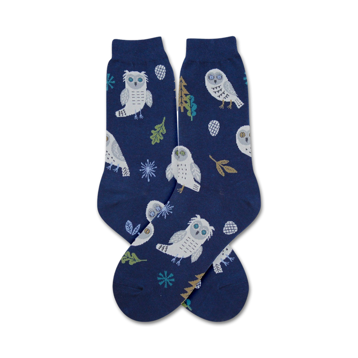 owl themed snowy blue crew socks with white, yellow, brown, and green snowy owl, pine cone, snowflake, and leaf pattern   }}