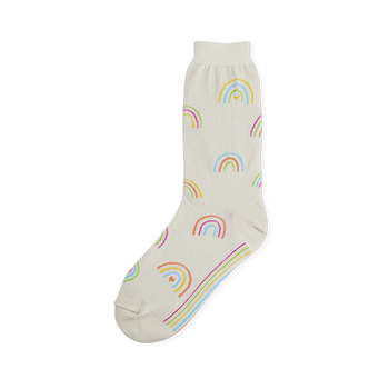 Off-white crew sock covered in small pastel rainbows with tiny hearts underneath, plus colorful stripes on the sole.