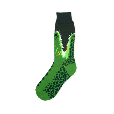 Black crew sock featuring a large green alligator head with open jaws, white teeth, and dark scale patterns down the foot.
