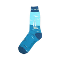 Crew socks in teal and light blue, depicting a sailboat on the ocean.  The socks also feature a small compass and the words 'Sail Away'.