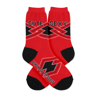 Red crew socks with black geometric design and the words 'Cute' and 'Sexy'. Black accents at the toes and cuffs.
