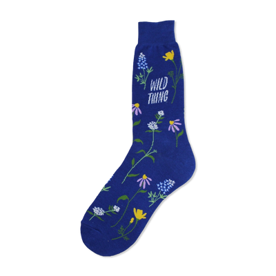 A close-up of a blue crew sock adorned with colorful wildflowers and the text 'Wild Thing'.
