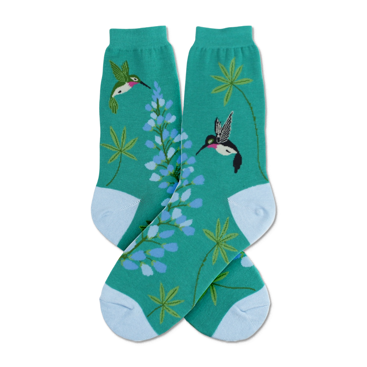 Crew socks in teal green, featuring colorful hummingbirds and lupine flowers. Light blue cuffs add a touch of contrast.