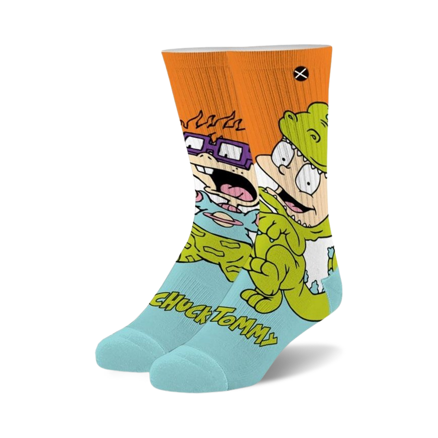 A pair of light blue crew socks featuring Tommy and Chuckie from Rugrats in a colorful cartoon design on an orange background.