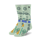 Lifestyle shot showing a person wearing the 'Don't Be Trashy' socks with a casual outfit.