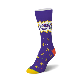 rugrats confetti socks for women. purple with yellow toe and heel. crew length sock features rugrats cartoon characters and shapes in yellow, orange, blue, and green.    