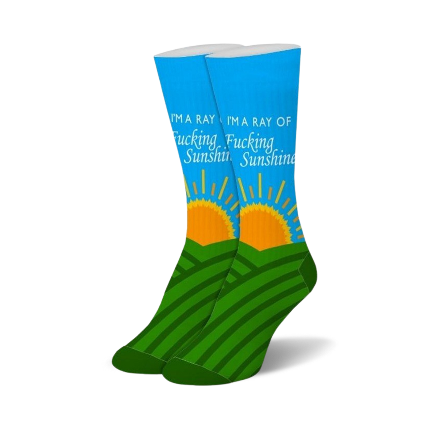 Pair of blue crew socks with green hills, an orange rising sun, and "I'M A RAY OF FUCKING SUNSHINE" text.