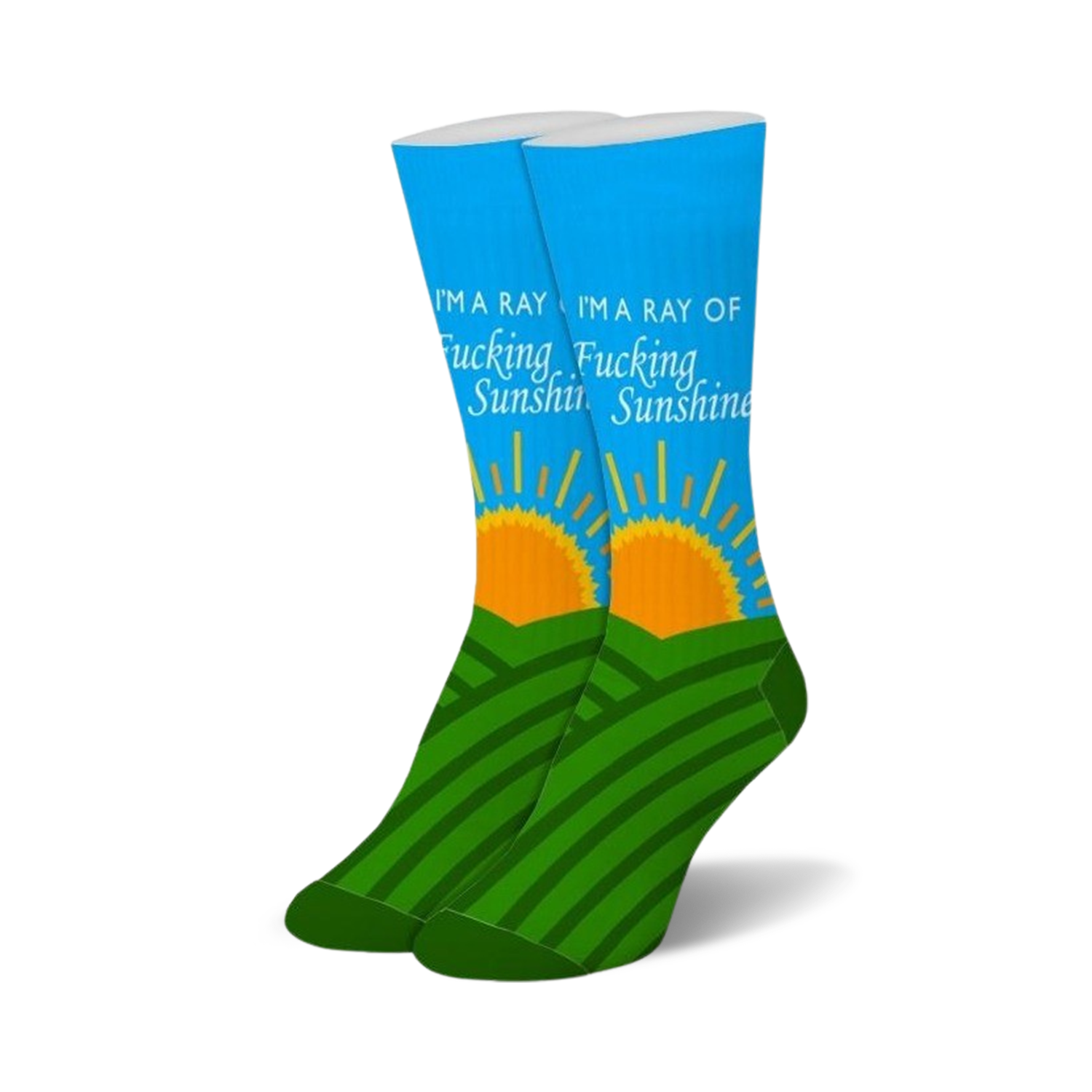 Pair of blue crew socks with green hills, an orange rising sun, and "I'M A RAY OF FUCKING SUNSHINE" text.
