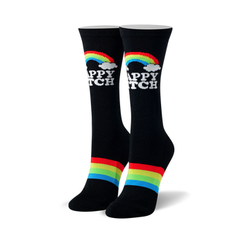 sassy "happy bitch" socks in black with cheerful white text, surrounded by rainbows and clouds. black toe and heel with rainbow ankle stripe. crew length, designed for women.   
