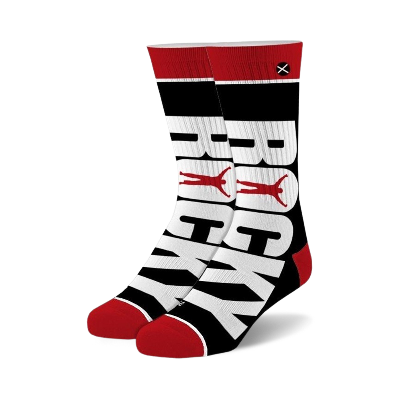 Pair of crew socks in black, white, and red. The socks feature the word 'ROCKY' in large letters, with a small red figure between each letter.