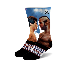 crew socks in black with blue and white striped top featuring a photo of rocky balboa and clubber lang from rocky iii.  