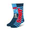 Crew socks in blue and red featuring the Jaws movie title and a cartoon shark emerging from the water. A fun, playful design for movie fans.